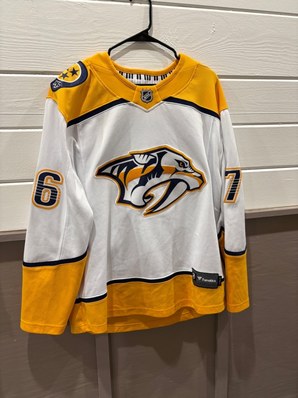 Fanatics NHL Nashville Predators Gold and Navy Hockey Jersey Collar Detail
